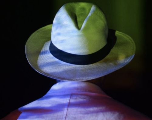 image of man in white fedora hat