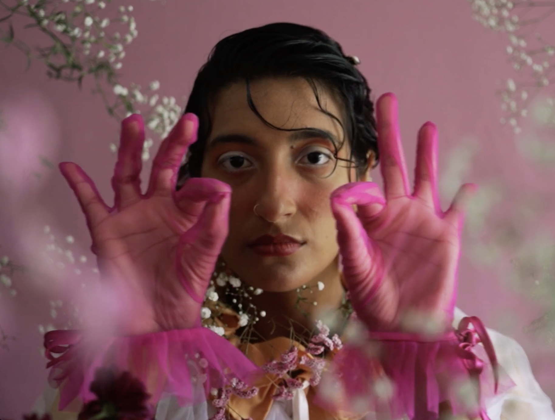 Screenshot from Cassandra's cinepoem "Body All Pearls Suite."